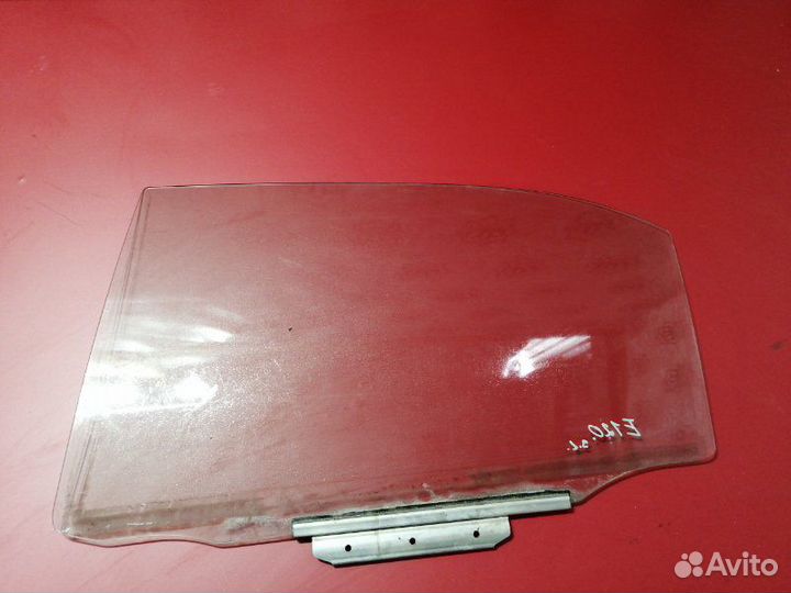 Стекло двери заднее левое Toyota Corolla E120