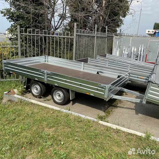 Прицеп двухосный с колесами под платформой