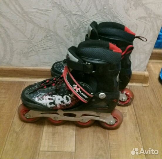 Роликовые коньки