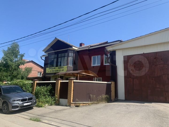 Коттедж 411 м² на участке 13,6 сот.