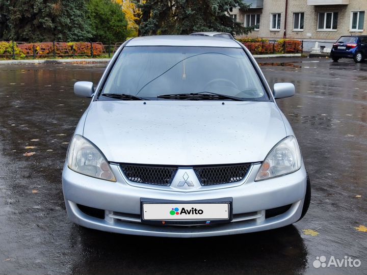 Mitsubishi Lancer 1.6 МТ, 2006, 300 000 км