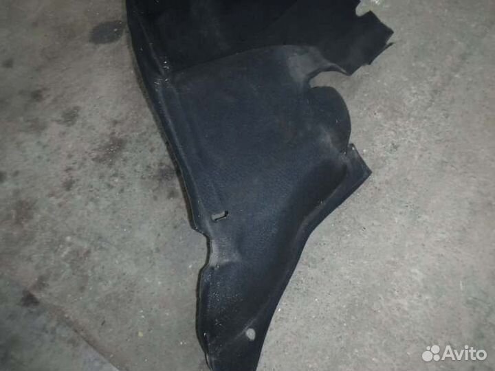 Обшивка багажника задняя левая Лада Гранта 11186