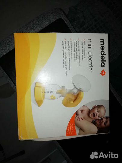 Молокоотсос medela электрический