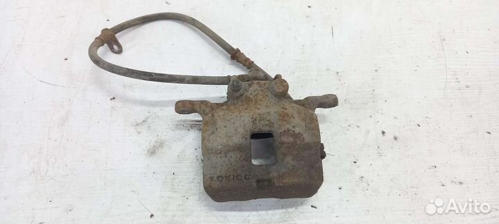 Суппорт передний левый Mitsubishi Pajero Sport2