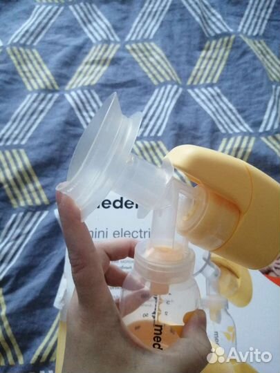 Молокоотсос medela электрический