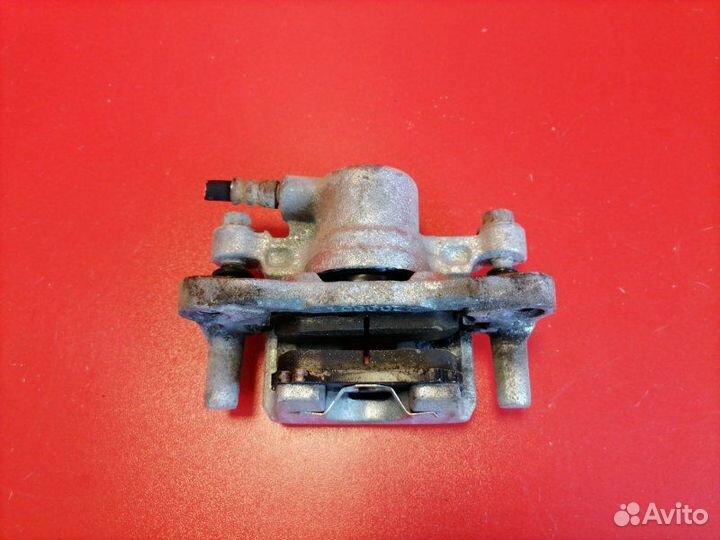 Суппорт задний правый Mitsubishi Lancer CY3A 4B10