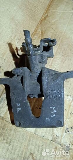 Суппорт тормозной задний левый Мондео 3