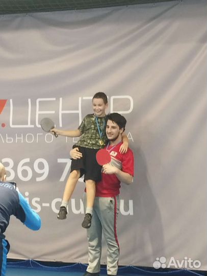 Теннисная ракетка