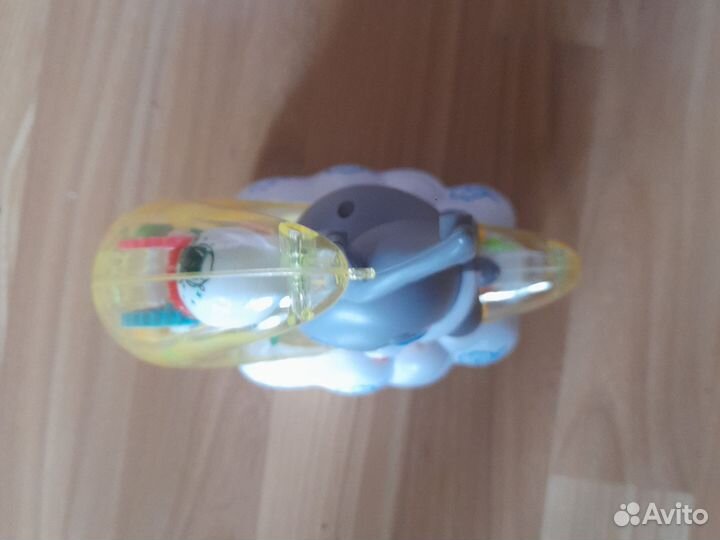 Игрушка музыкальный зайчик на колесах