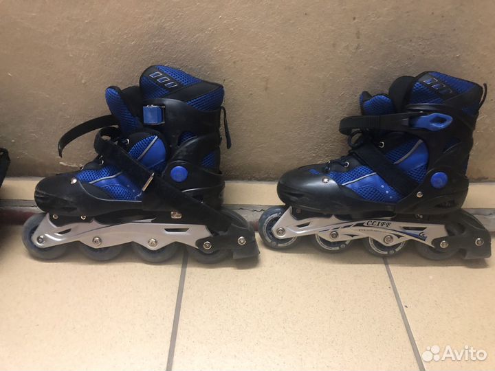 Роликовые коньки