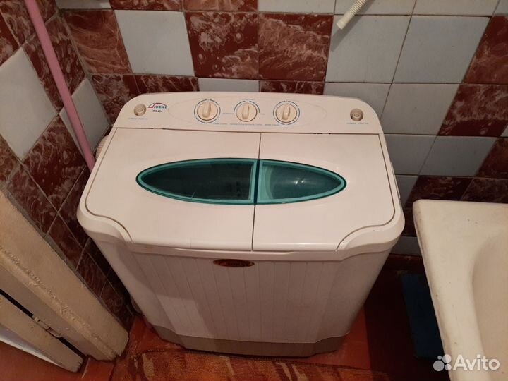 Стиральная машина с вертикальной загрузкой