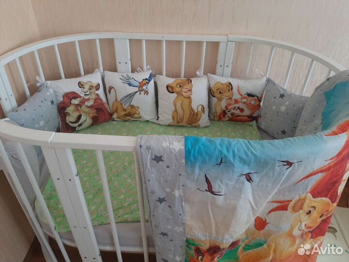 Детская кроватка с поперечным маятником