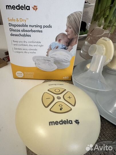 Молокоотсос medela swing maxi электрический