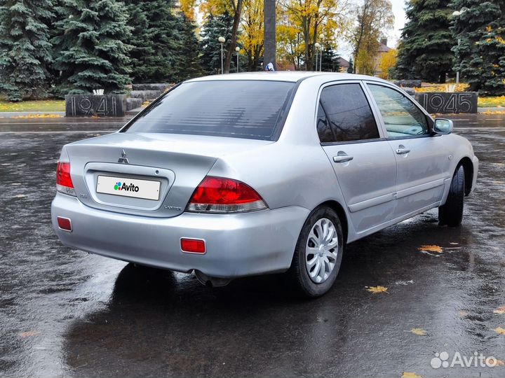 Mitsubishi Lancer 1.6 МТ, 2006, 300 000 км