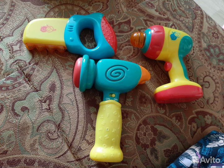 Игрушки музыкальные,руль,юла,инструменты