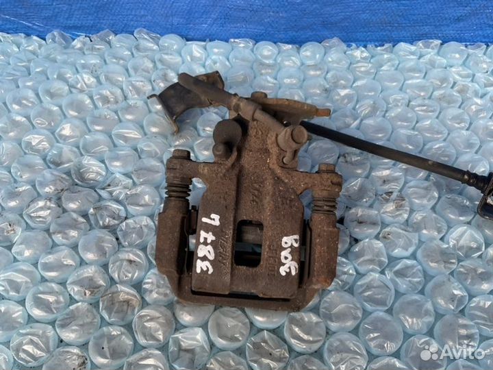 Суппорт задний левый Honda Accord CT2 3.5L J35Y2