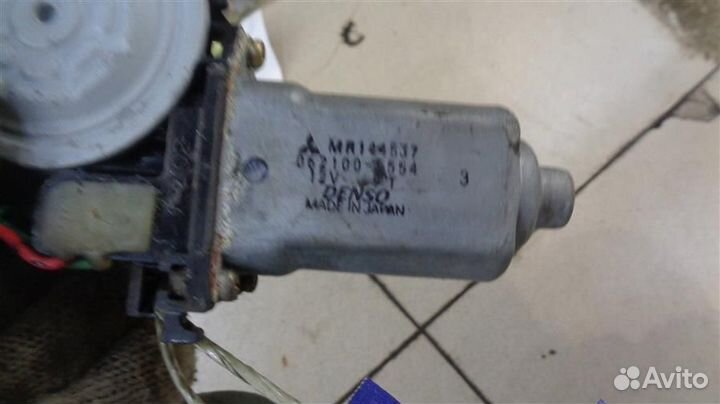 Моторчик стеклоподъемника задний левый Mitsubishi