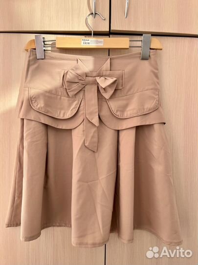 Бежевая юбка с бантом