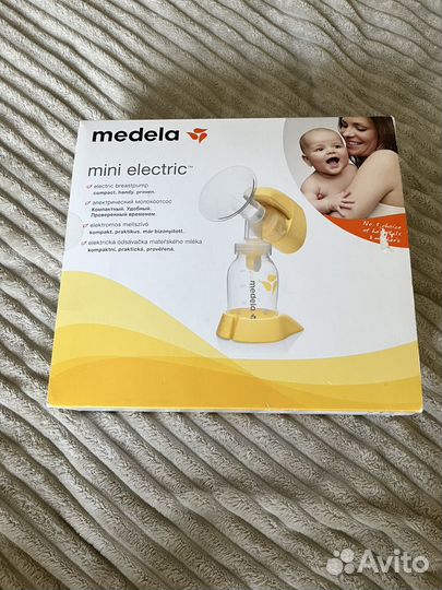 Молокоотсос medela электрический