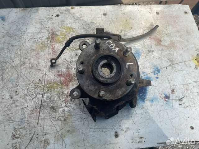 Поворотный кулак передний левый Kia Soul 1 2008