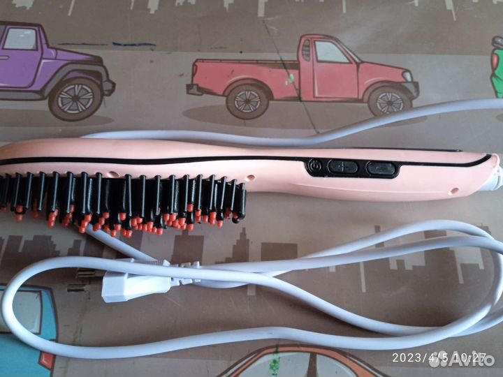 Электрическая расчёска-выпрямитель