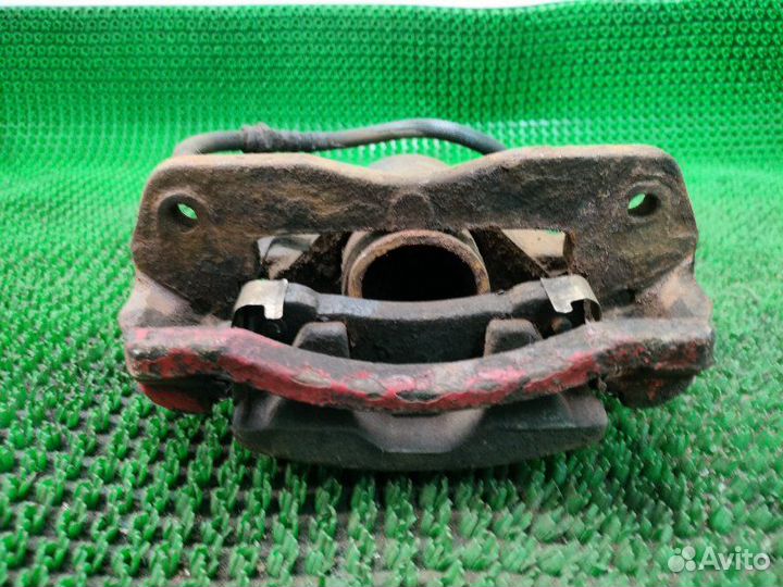 Суппорт передний левый Mazda 626 GE FS 1995