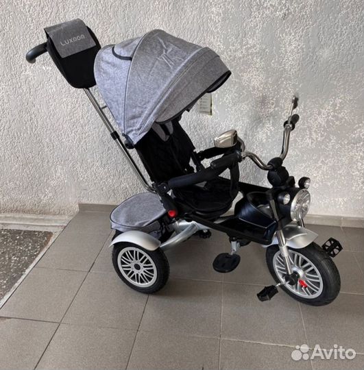 Коляска с поворотом с ручкой Luxmom 5199