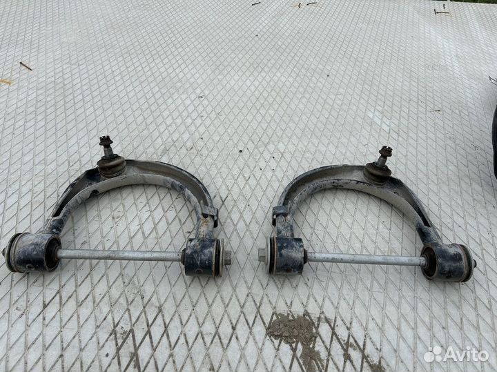 4863060030 Передний левый верхний рычаг