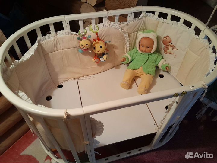 Детская кроватка трансформер овальная на колёсах