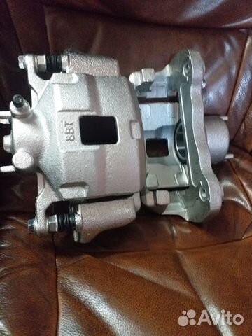 Суппорт передний Mitsubishi L200