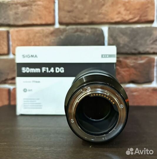 Объектив sigma 50 F/1.4 для sony
