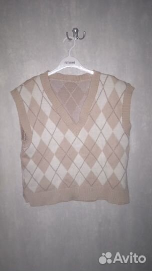 Меховая жилетка