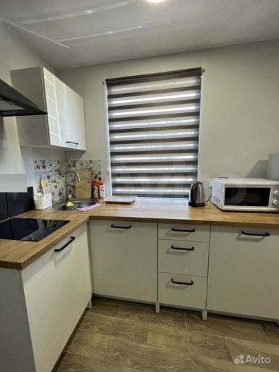 Дом из морского контейнера с террасой на крыше