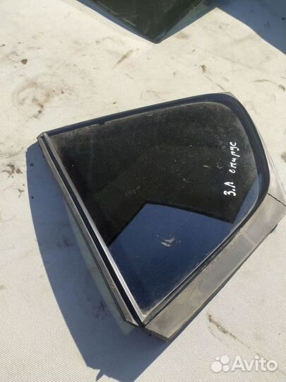 Стекло двери задней левой (форточка) Kia Quoris I