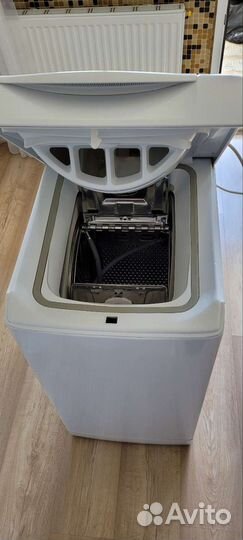 Стиральная машина с вертикальной загрузкой