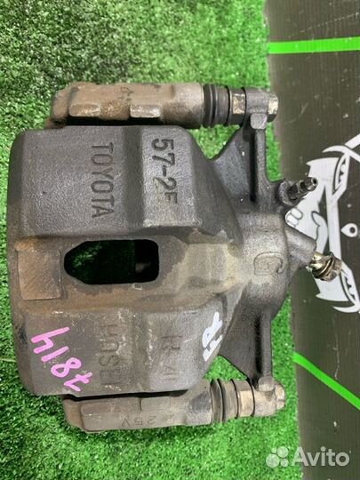 Суппорт тормозной передний правый Toyota Caldina