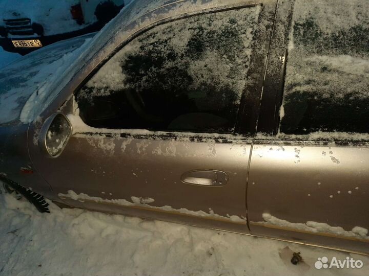 Двери правая левая Кia Clarus 2