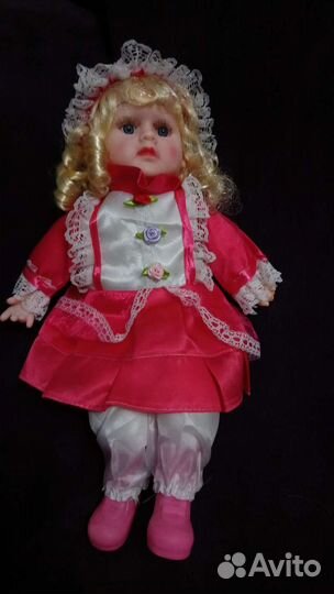 Кукла мягконабивная сидячая