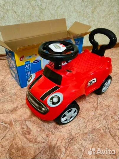 Машина каталка новая