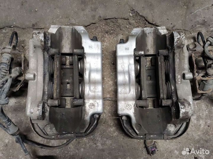 Суппорт тормозной задний Порше Каен 955