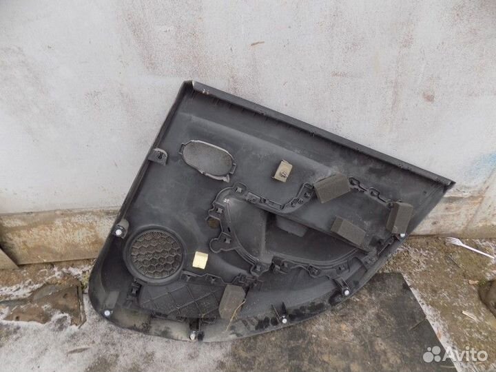 Обшивка двери задней левой Sandero 2014