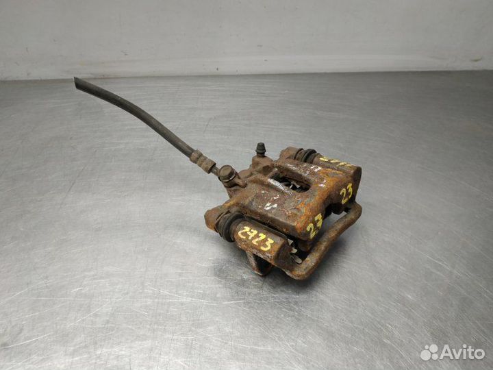 Суппорт задний левый Toyota Corolla 9 E120 4zzfe