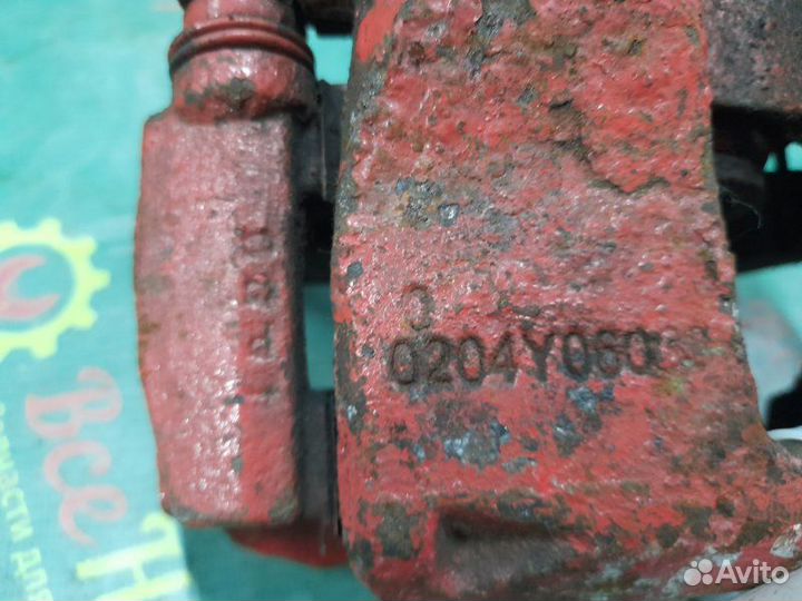 Суппорт передний левый Geely Emgrand Ec7