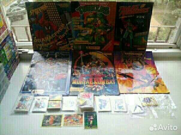 Альбомы наклейки panini