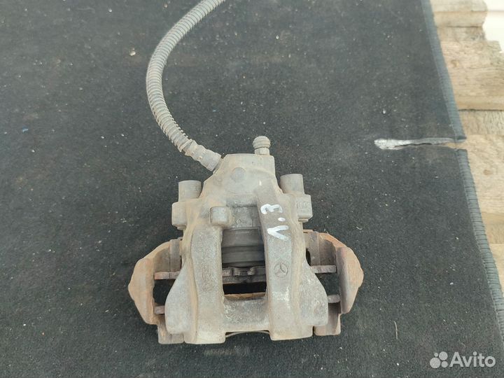 Мерседес W211 задний левый суппорт
