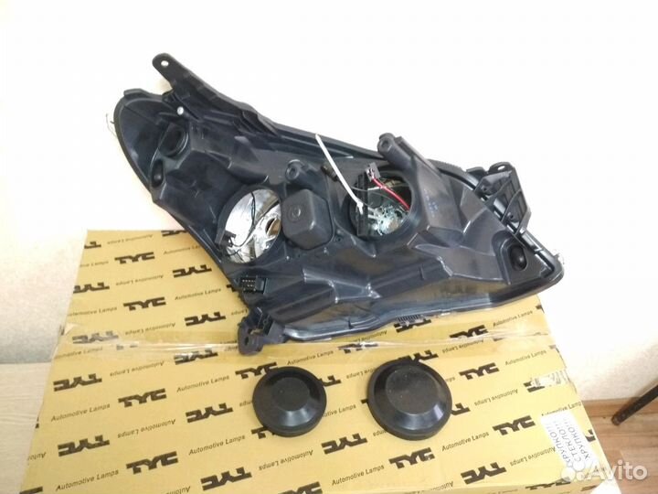 Фара левая Opel Astra H