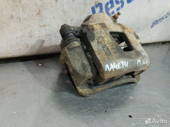 Суппорт тормозной передний левый Chevrolet Lacetti