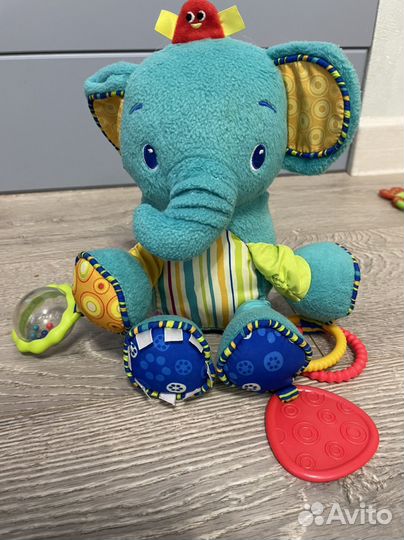 Развивающие игрушки погремушки Tiny love