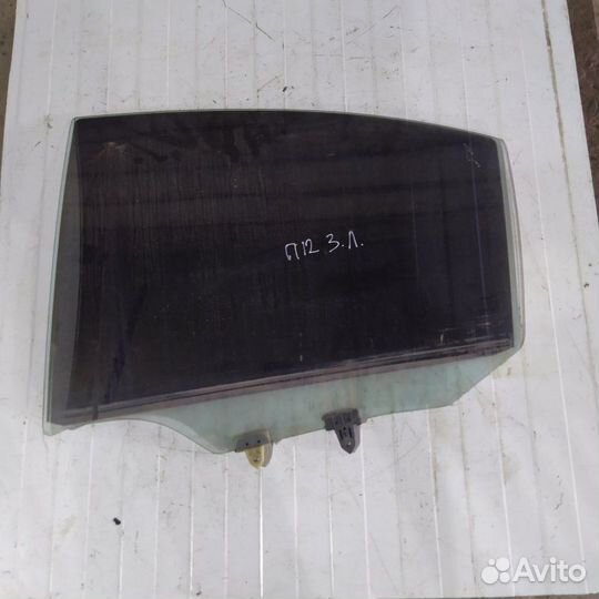 Стекло двери заднее левое Nissan Primera P 12 1