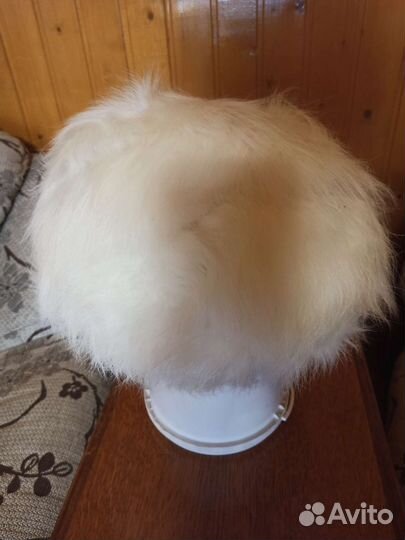 Женские меховые шапки